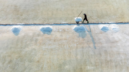 June 9, 2023: scene of salt production from seawater by people in Song Cau town, Phu Yen province, Vietnamの写真素材