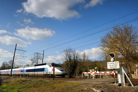 a passenger train in the French countryside              