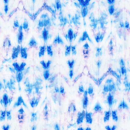Beautiful seamless tie-dye pattern on white silk. Batik-hand painting fabrics - nodular batik. Shibori dyeing.の写真素材