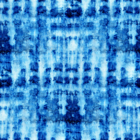 Seamless tie-dye pattern of indigo color on white silk. Hand painting fabrics - nodular batik. Shibori dyeing.の写真素材