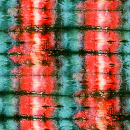 Seamless tie-dye pattern on white silk. Hand painting fabrics - nodular batik. Shibori dyeing.の写真素材