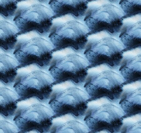 Seamless tie-dye pattern of indigo color on white silk. Hand painting fabrics - nodular batik. Shibori dyeing. の写真素材