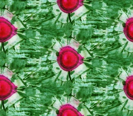 Seamless tie-dye pattern of green and red color on white silk. Hand painting fabrics - nodular batik. Shibori dyeing.の写真素材