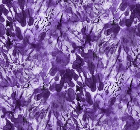 Seamless tie-dye pattern of indigo color on white silk. Hand painting fabrics - nodular batik. Shibori dyeing.の写真素材
