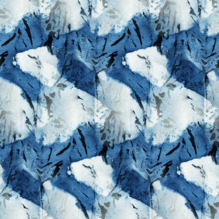 Seamless tie-dye pattern of indigo color on white silk. Hand painting fabrics - nodular batik. Shibori dyeing.の写真素材