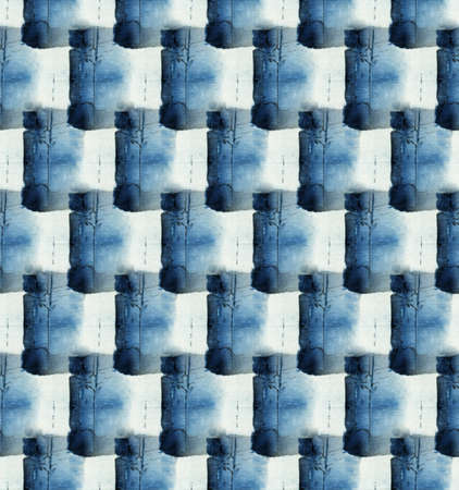 Seamless tie-dye pattern of indigo color on white silk. Hand painting fabrics - nodular batik....