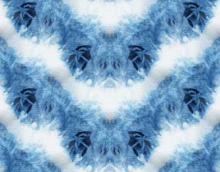 Seamless tie-dye pattern of indigo color on white silk. Hand painting fabrics - nodular batik....