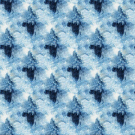Seamless tie-dye pattern of indigo color on white silk. Hand painting fabrics - nodular batik. Shibori dyeing.の写真素材