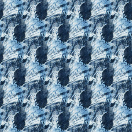 Seamless tie-dye pattern of indigo color on white silk. Hand painting fabrics - nodular batik. Shibori dyeing.の写真素材