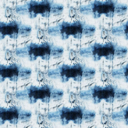 Seamless tie-dye pattern of indigo color on white silk. Hand painting fabrics - nodular batik....