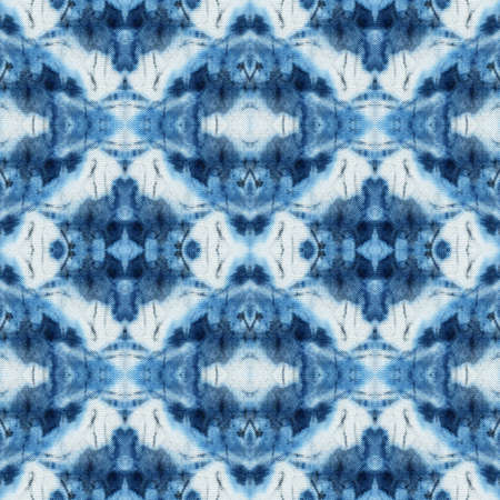 Seamless tie-dye pattern of indigo color on white silk. Hand painting fabrics - nodular batik....