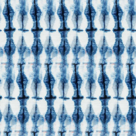 Seamless tie-dye pattern of indigo color on white silk. Hand painting fabrics - nodular batik....