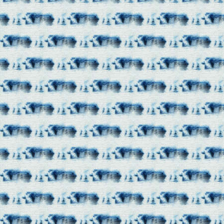Seamless tie-dye pattern of indigo color on white silk. Hand painting fabrics - nodular batik....
