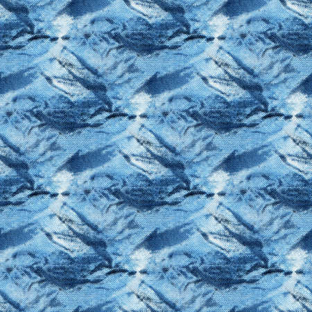 Seamless tie-dye pattern of indigo color on white silk. Hand painting fabrics - nodular batik. Shibori dyeing.の写真素材