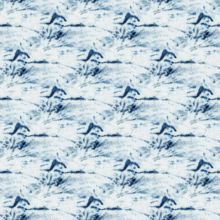 Seamless tie-dye pattern of indigo color on white silk. Hand painting fabrics - nodular batik. Shibori dyeing.の写真素材