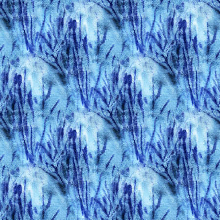 Seamless tie-dye pattern of indigo color on white silk. Hand painting fabrics - nodular batik. Shibori dyeing.の写真素材