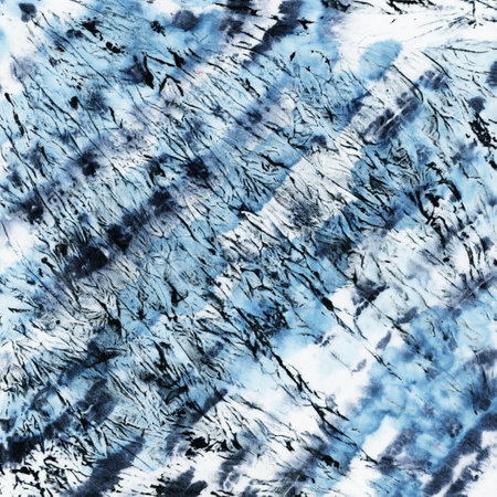 Tie-dye pattern of indigo color on white silk. Hand painting fabrics - nodular batik. Shibori dyeing.の写真素材