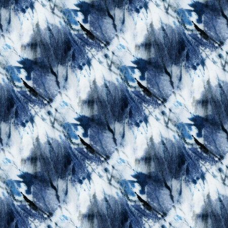Seamless tie-dye pattern of indigo color on white silk. Hand painting fabrics - nodular batik. Shibori dyeing.の写真素材