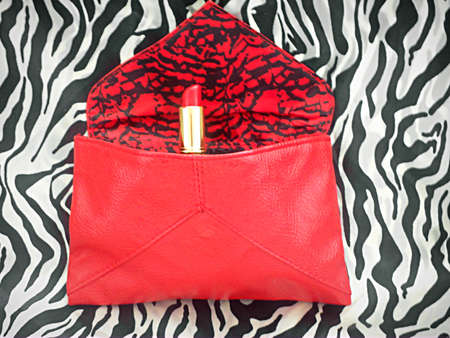 Red lipstick in red bagの写真素材