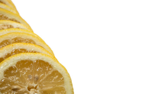 Sliced lemon over white background with copy space for your textの写真素材