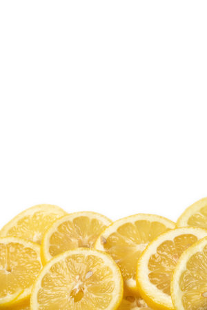 Sliced lemon over white background with copy space for your textの写真素材