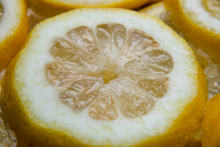 Sliced lemon over white background with copy space for your textの写真素材