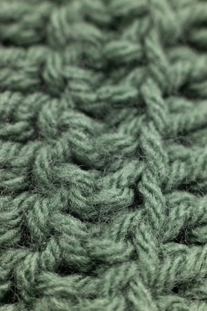 close-up of vertical crochet rows in sage green, crocheted or knitted, reminds you of grandma's...