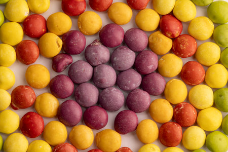 Gradient Circle made of Dye-free natural candy with no artificial ingredients isolated on a white background in groups based on the color, healthier alternative, good option for ADHD childrenの写真素材