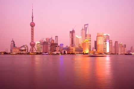 Skyline of Lujiazui and Pudong with the Oriental Pearl Tower, Jiinmao Tower and Shanghai World Financial Center (SWFC), across the Huangpu river, Shanghai, China, Asiaのeditorial素材