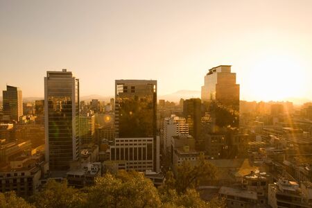 Downtown view at sunset from Santa Lucia Hill, Santiago, Chile, South Americaの写真素材