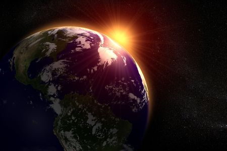 Space landscape of the sun rising behind the earthの写真素材