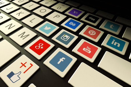 Santiago, Chile - October 16, 2014:  The most popular and visited social media web sites on 2014 represented with the logos embedded in a keyboard.のeditorial素材