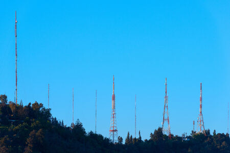 Telecommunications towers over San Cristobal hillの写真素材