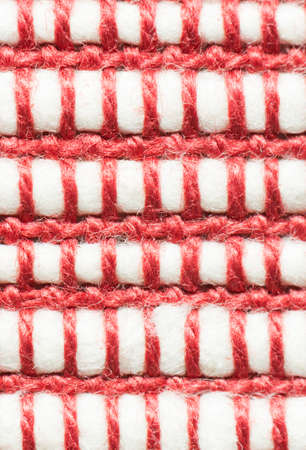 A macro close up of a red and white fabricの写真素材