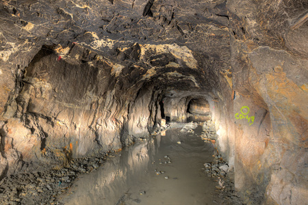 Inside the tunnel of a gold and copper underground mine in Chile
