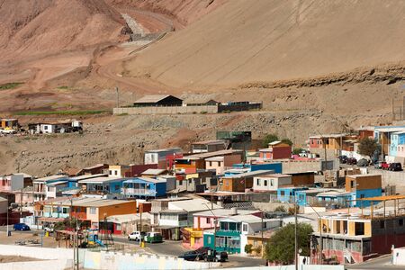 Antofagasta, Antofagasta Region, Chile - April 19, 2017: Caleta Coloso, a small group of houses at the south of the city of Antofagasta, near the port Puerto Coloso serving with small popular restaurants the tourist and workers of the port.のeditorial素材
