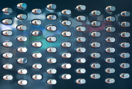 Extreme macro close up of a cheese graterの写真素材