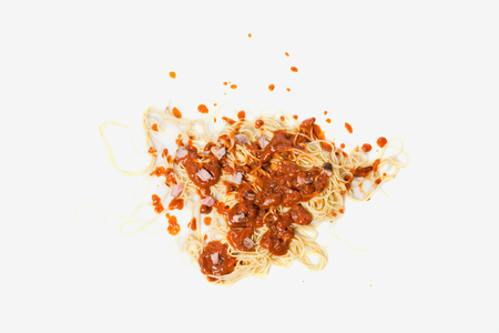 A fallen dish of pasta on the floorの写真素材