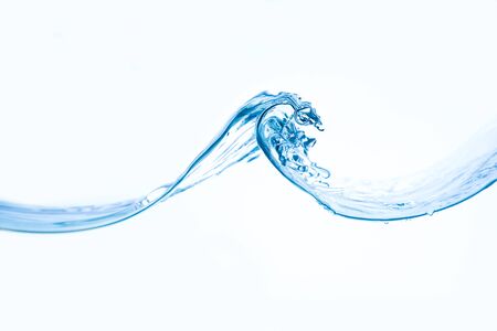 Wave of water against a white backgroundの写真素材