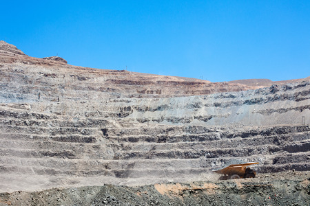 Huge dump trucks in an open pit Copper mine at northern Chile