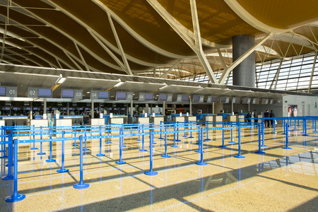 Pudon, Shanghai, China - November 30, 2008: Empty counters at Shanghai Pudong International Airport.のeditorial素材