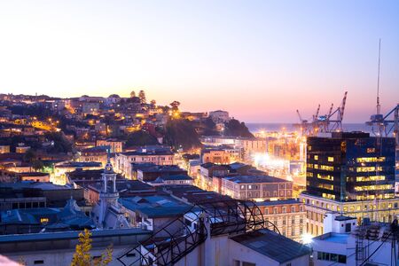 View of typical houses at Cerro Cordillera and port facilities, Valparaiso, Valparaiso Region, Chile, South Americaの写真素材