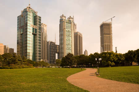 Shanghai, China -Skyline of modern office buildings at Lujiazui Financial district from Central Greenfield in Pudong.のeditorial素材