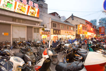 Shanghai, Huangpu district, China, Asia  - Motorcycle parking zone at Nanjing Road the main commercial street in Shanghai.のeditorial素材