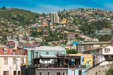 Valparaiso, Region de Valparaiso, Chile - Cityscape of Valparaiso with the deck of a restaurant and the houses on the hills in the back.のeditorial素材