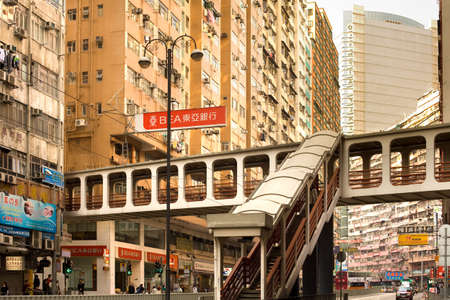North Point district (Pak Kok), Hong Kong Island, China, Asia - Footbridge at King's Road and larga...
