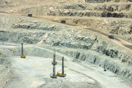 Blasthole drill in an open pit copper mine operation in Chile