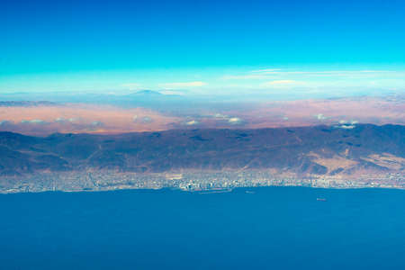 Aerial view of the coastline of Antofagasta, know as the Pearl of the North and the biggest city in the Mining Region of northern Chile.の写真素材