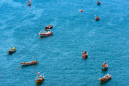 View from above of little fishing boats in the coasts of Antofagasta, Chileの写真素材
