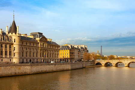 The Conciergerie at Justice Palace and Pont Neuf Bridge over the Seine River, Ile de la Cite, Paris, Franceの写真素材